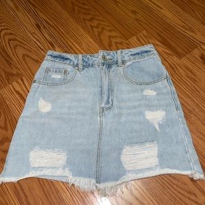 Ripped denim skirt